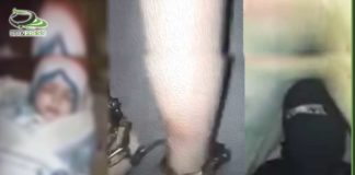 حبس سيدة وطفلها الرضيع وتكبيلها بقيود وسلاسل حديدية